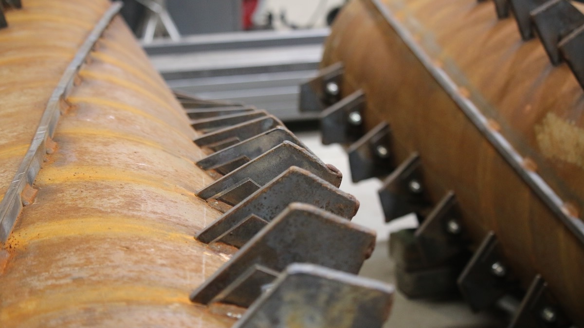 Fabricated metal hay crushers